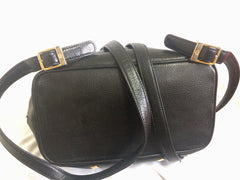 Vintage MCM black leather backpack with golden studded logo motifs. Designed by Michael Cromer. Unisex bag for daily use.