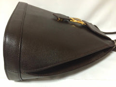Vintage MOSCHINO genuine dark brown leather backpack with golden and black M logo motif from cheap and chic by moschino. Perfect daily bag. 060528r1