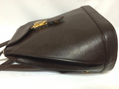 Vintage MOSCHINO genuine dark brown leather backpack with golden and black M logo motif from cheap and chic by moschino. Perfect daily bag. 060528r1