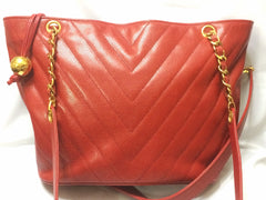 Vintage CHANEL red caviarskin v stitch, chevron style chain shoulder tote bag with golden CC ball charm. Classic purse for daily use.