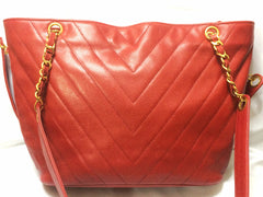 Vintage CHANEL red caviarskin v stitch, chevron style chain shoulder tote bag with golden CC ball charm. Classic purse for daily use.