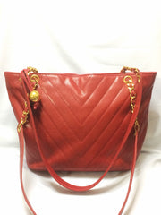 Vintage CHANEL red caviarskin v stitch, chevron style chain shoulder tote bag with golden CC ball charm. Classic purse for daily use.