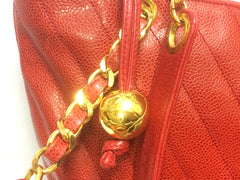 Vintage CHANEL red caviarskin v stitch, chevron style chain shoulder tote bag with golden CC ball charm. Classic purse for daily use.