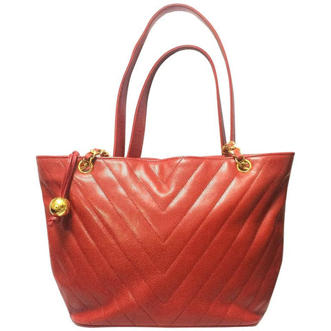 Vintage CHANEL red caviarskin v stitch, chevron style chain shoulder tote bag with golden CC ball charm. Classic purse for daily use.